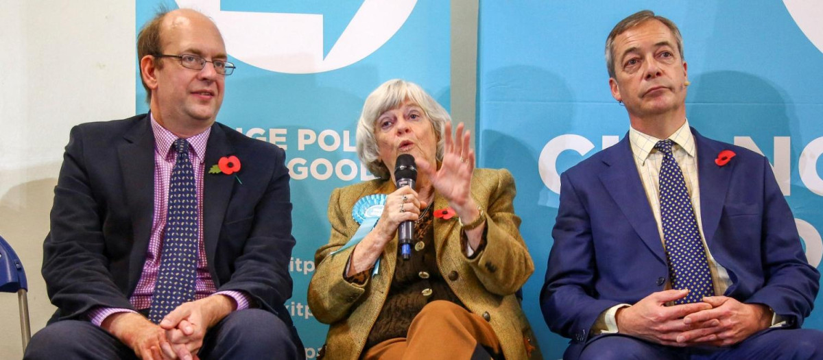 Brexit Party MEP for South West England, Ann Widdecombe (C), sits and speaks alongside Brexit Party politician Mark Reckless (L) and Brexit Party leader Nigel Farage, during a general election campaign visit to Pontypool in south Wales on November 8, 2019. Britain goes to the polls on December 12 to vote in a pre-Christmas general election. (Photo by GEOFF CADDICK / AFP)