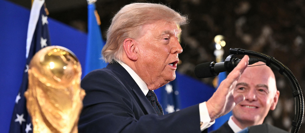 FIFA President Gianni Infantino (R) smiles as US President Donald Trump speaks during a FIFA reception at Trump Tower in New York on July 17, 2026. President Trump will attend the 2026 World Cup Final between Spain and Argentina. (Photo by Mandel NGAN / AFP)