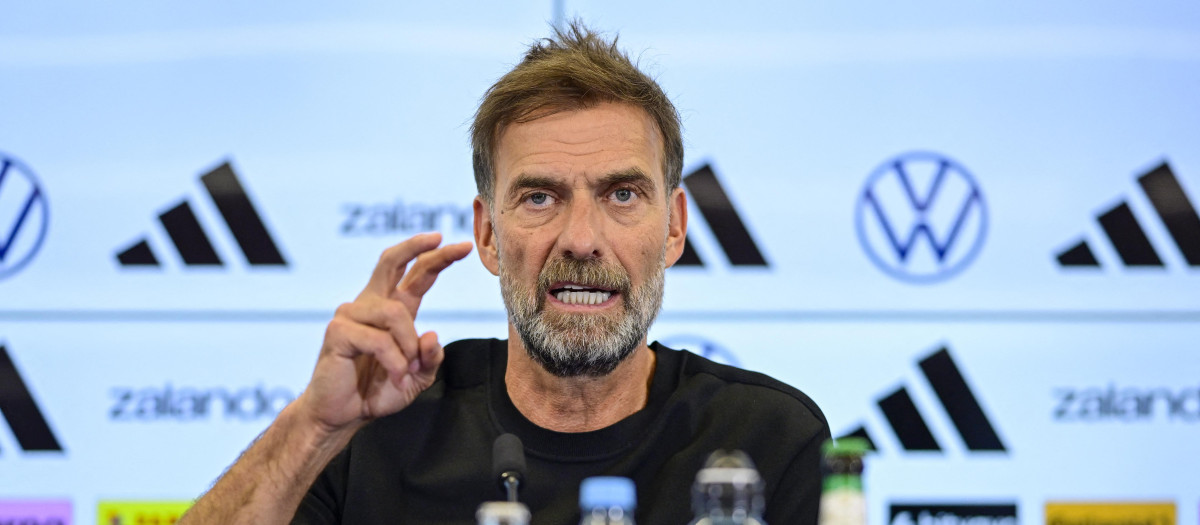 Newly appointed German coach Jurgen Klopp addresses a press conference at the headquarters of the German Football Federation (DFB) in Frankfurt am Main, western Germany on July 24, 2026. Jurgen Klopp was named as the new head coach of the German men's national football team on July 24, replacing Julian Nagelsmann who was dismissed after the team's disappointing World Cup performance. Klopp, famed for his success during stints as coach at Borussia Dortmund and especially Liverpool, has been in talks with the DFB about trying to lead Germany -- long a football powerhouse -- back to prominence. (Photo by John MACDOUGALL / AFP)