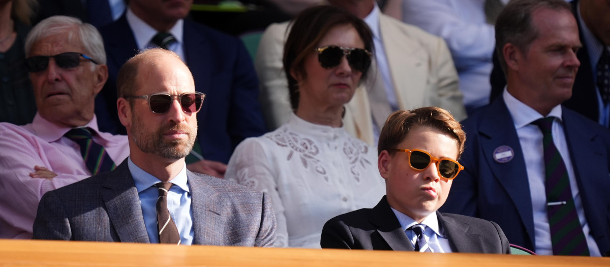 William, Prince of Wales, Prince George of Wales and Stefan Edberg sitting in the stands wearing sunglasses during celebrities at Wimbledon 2026 in London, UK, on Sunday, 12 July 2026.