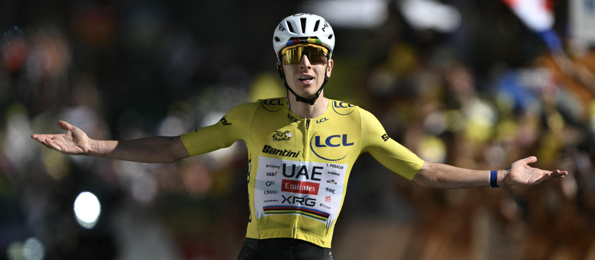 UAE Team Emirates - XRG's Slovenian rider Tadej Pogacar wearing the overall leader's yellow jersey cycles to the finish line to win the 19th stage of the 113th edition of the Tour de France cycling race, 127,9 km between Gap and Alpe d'Huez in the French Alps, on July 24, 2026. (Photo by Jeff PACHOUD / AFP)