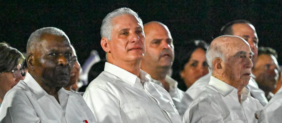 (L to R) Cuba's head of Parliament Esteban Lazo, President Miguel Díaz-Canel, and Commander Jose Ramon Machado Ventura attend the 73rd anniversary celebration of the guerrilla assault on the Moncada Barracks, led by the late leader Fidel Castro and considered the start of the Cuban Revolution, in Pinar del Rio, Cuba, on July 26, 2026. (Photo by YAMIL LAGE / AFP)