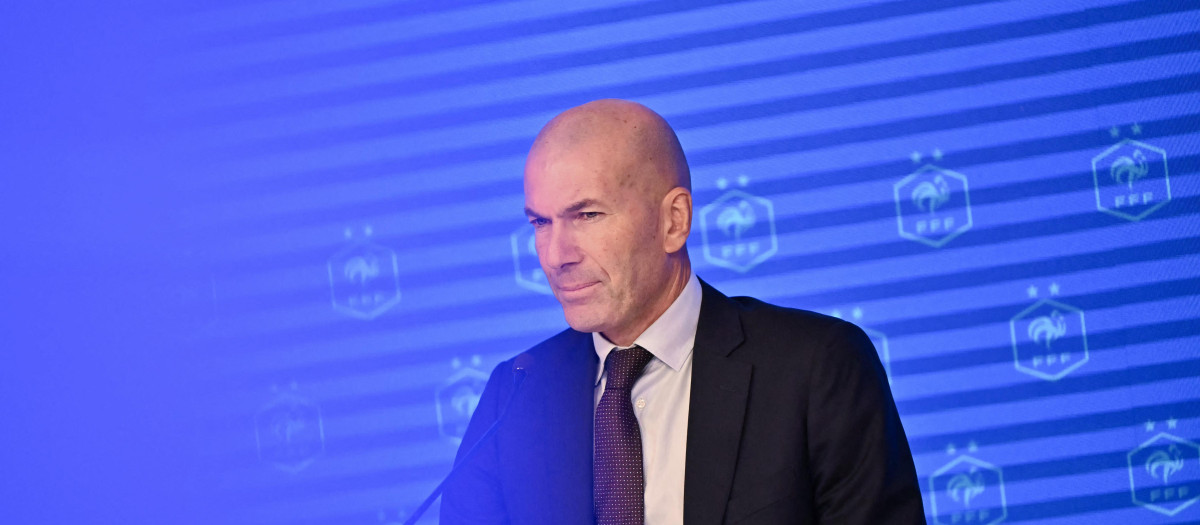 Former French international football player Zinedine Zidane looks on during a press conference to present him as the new head coach of France national football team at the French Football Federation headquarters (FFF) in Paris on July 28, 2026. The former France playmaker, who won the 1998 World Cup and the 2000 European Championship as a player, has been appointed head coach of the French national team, succeeding Didier Deschamps, the French Football Federation (FFF) announced. Zidane takes over from his former teammate Deschamps, who had been in charge since 2012; Deschamps' tenure ended with a fourth-place finish at the 2026 World Cup, following a title win in 2018 and a final appearance in 2022. (Photo by LOU BENOIST / AFP)