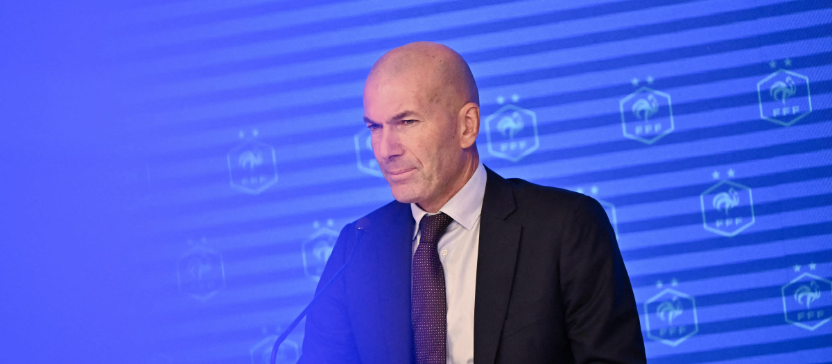Former French international football player Zinedine Zidane looks on during a press conference to present him as the new head coach of France national football team at the French Football Federation headquarters (FFF) in Paris on July 28, 2026. The former France playmaker, who won the 1998 World Cup and the 2000 European Championship as a player, has been appointed head coach of the French national team, succeeding Didier Deschamps, the French Football Federation (FFF) announced. Zidane takes over from his former teammate Deschamps, who had been in charge since 2012; Deschamps' tenure ended with a fourth-place finish at the 2026 World Cup, following a title win in 2018 and a final appearance in 2022. (Photo by LOU BENOIST / AFP)