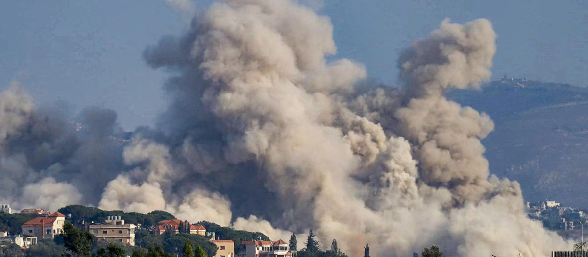 Smoke rises following an Israeli controlled-explosion on the village of Kfartibnit as seen from Nabatieh in southern Lebanon on July 29, 2026. While violence has declined since the signing of a preliminary US-Iran deal in June and the Lebanon-Israel agreement, Lebanon continues to report intermittent Israeli strikes and artillery shelling on the south. Lebanon's army on July 26 condemned ongoing Israeli military activities that it said were preventing its full deployment under the framework deal. (Photo by Ammar Ammar / AFP) /