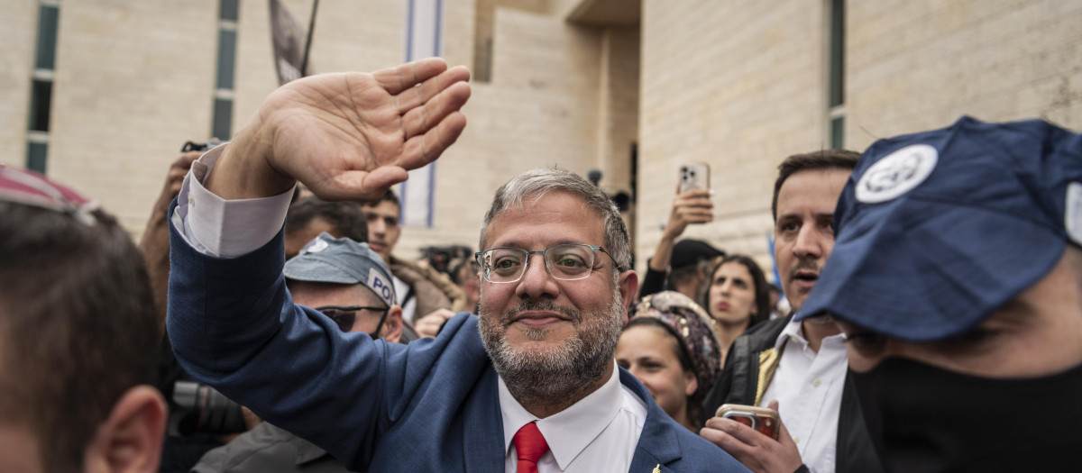Itamar Ben-Gvir, 49, Israel's Minister of National Security, waves supporters after a rally in his support, in front of the Israeli Supreme Court in Jerusalem.