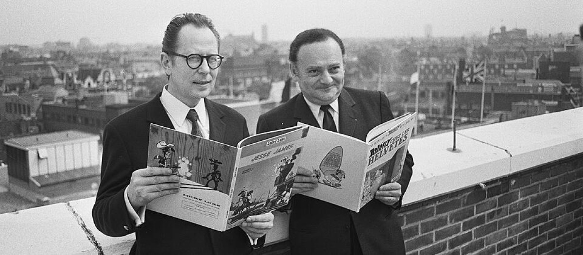 Morris y Goscinny con ejemplares de Lucky Luke y Astérix, respectivamente