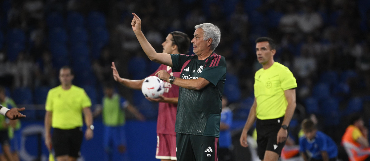 Real Madrid's Portuguese coach Jose Mourinho gestures during the Teresa Herrera Trophy friendly football match between RC Deportivo de la Coruna and Real Madrid CF at Municipal de Riazor Stadium in A Coruna on August 12, 2026. (Photo by Miguel RIOPA / AFP)