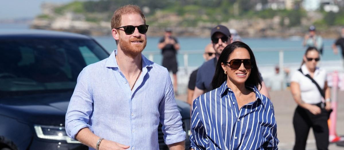 Britain's Prince Harry, Duke of Sussex, and his wife Meghan, the Duchess of Sussex, arrive to meet with volunteer first responders from Bondi Surf Bathers' Life Saving Club at Bondi Beach in Sydney on April 17, 2026. (Photo by Jonathan Brady / POOL / AFP)