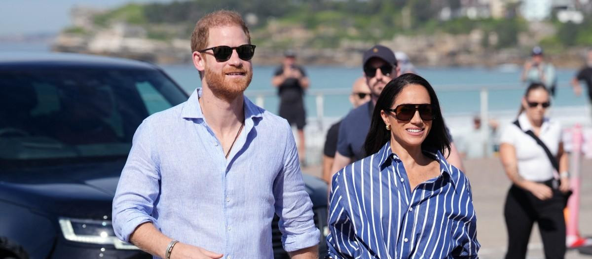 Britain's Prince Harry, Duke of Sussex, and his wife Meghan, the Duchess of Sussex, arrive to meet with volunteer first responders from Bondi Surf Bathers' Life Saving Club at Bondi Beach in Sydney on April 17, 2026. (Photo by Jonathan Brady / POOL / AFP)