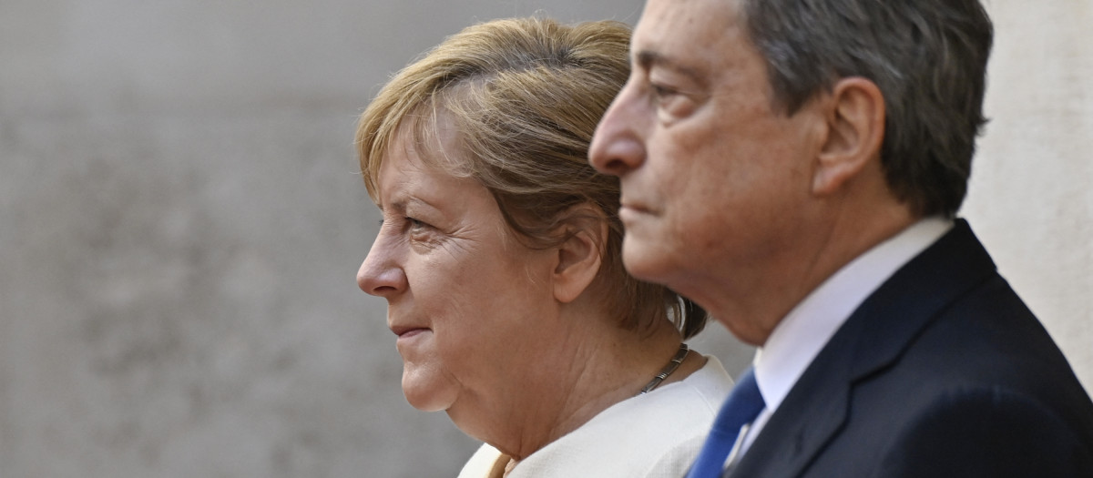 Mario Draghi y Angela Merkel