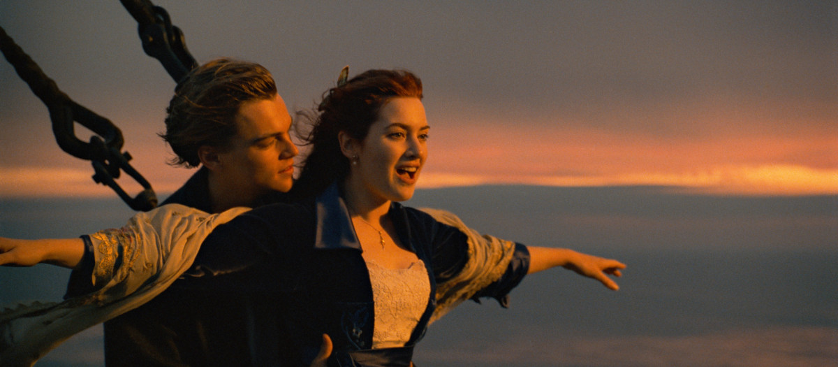 TITANIC, from left: Leonardo DiCaprio, Kate Winslet, 1997. TM & Copyright ©20th Century Fox Film Corp. All rights reserved./Courtesy Everett Collection 
1990s movies 1997 movies 4MMR12 Arms outstretched Couple Dicaprio,leonardo Exterior Movies PvVAM Red hair Ship Ste-DOM Winslet,kate