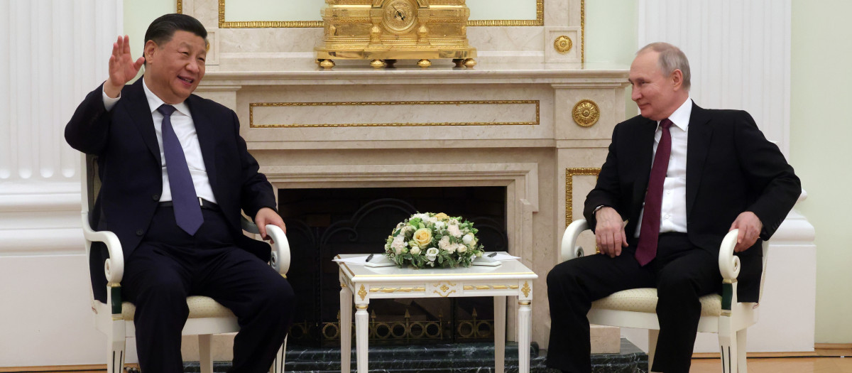 Russian President Vladimir Putin meets with China's President Xi Jinping at the Kremlin in Moscow on March 20, 2023. (Photo by Sergei KARPUKHIN / SPUTNIK / AFP)