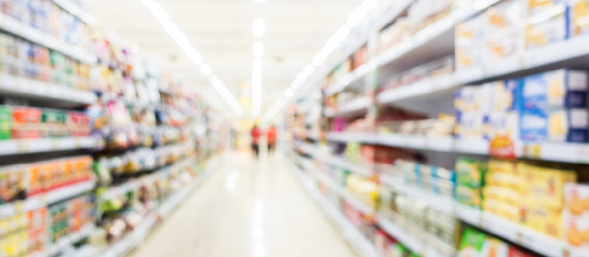 Abstract blur supermarket and retail store in shopping mall interior for background