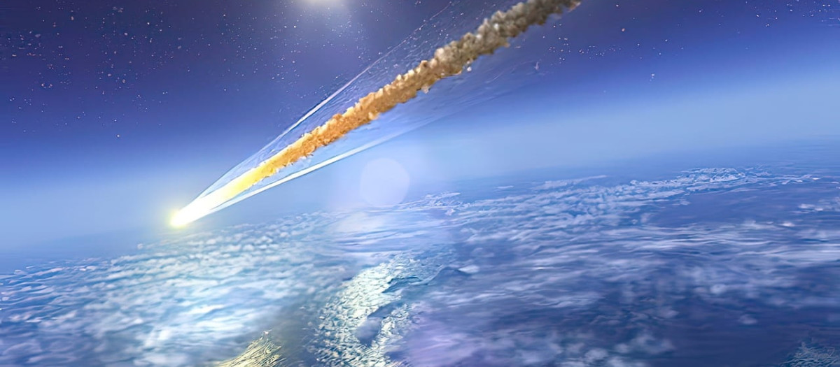 Un cometa surca el cielo cerca de un planeta