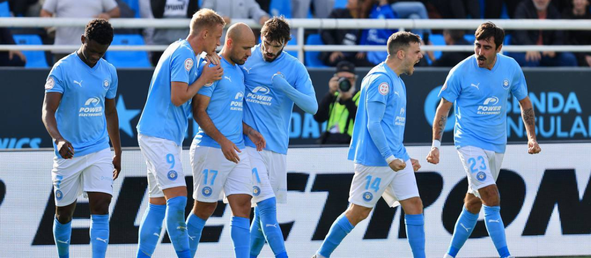 Los jugadores del Ibiza celebran un gol contra el Castellón