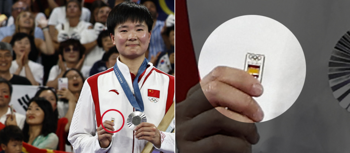 He Bingjiao ha subido al podio con una pequeña bandera de España