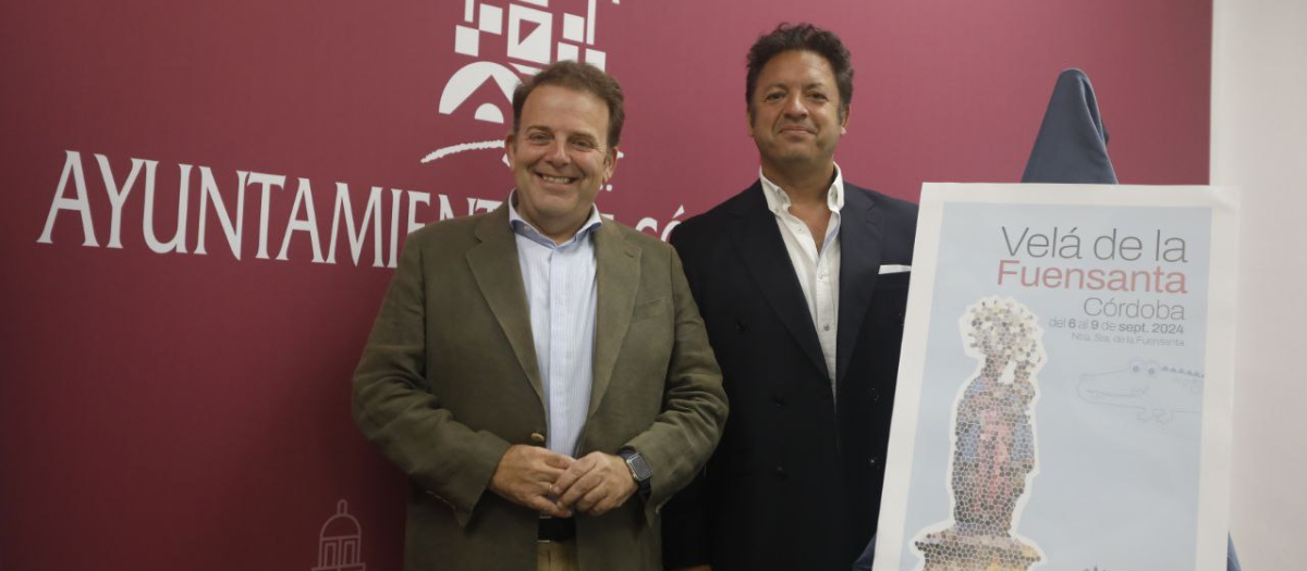 Julián Urbano y Marcos Santiago, junto al cartel de la Velada de la Fuensanta