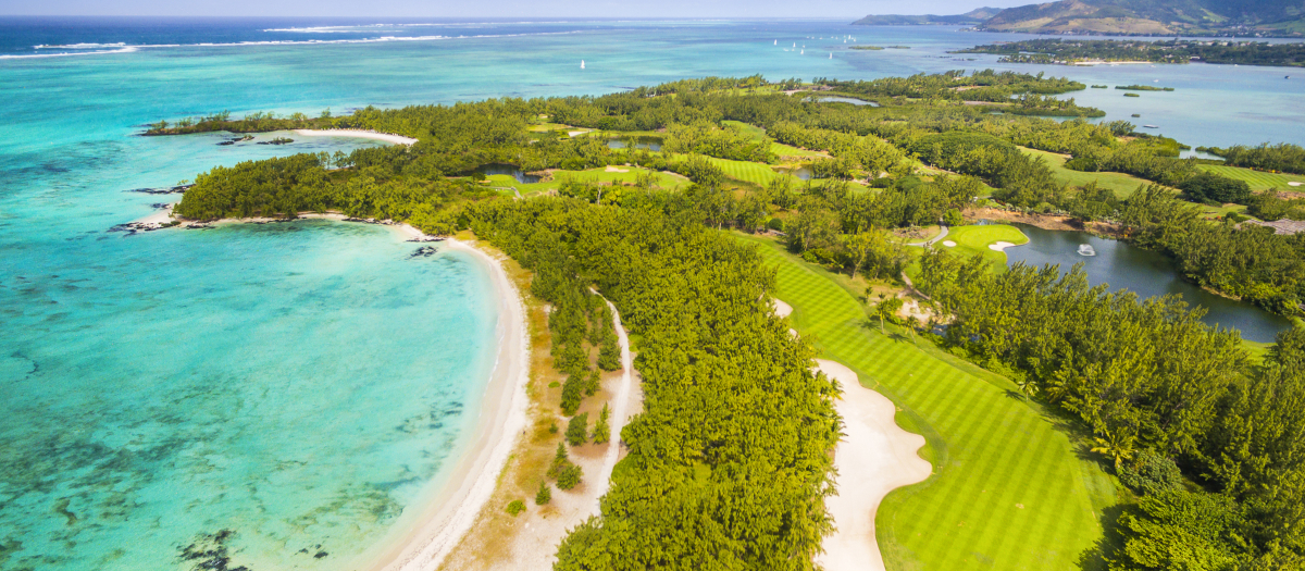 Mauritius beach aerial view of Ile Aux Cerf Beach island golf club on East Coast