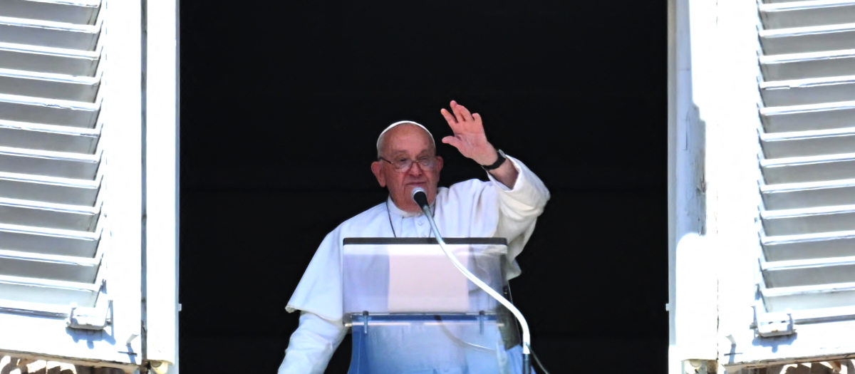 Pope Francis delivers his speech to the crowd, from the window of the Apostolic Palace overlooking St. Peter's Square, during the weekly Angelus prayer in the Vatican on September 15, 2024. (Photo by Andreas SOLARO / AFP)