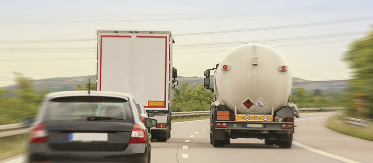 Truck on highway road with container, transportation concept.,import,export logistic industrial Transporting Land transport on asphalt expressway with blue sky