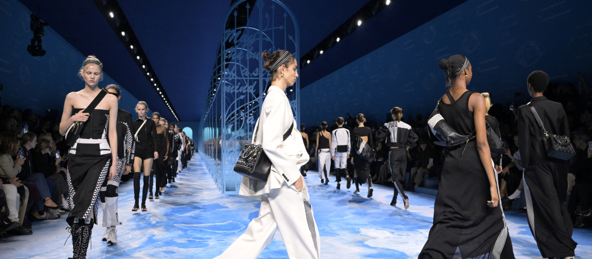 Models walk on the catwalk after the presentation by Dior for the Women Ready-to-wear Spring-Summer 2025 collection as part of the Paris Fashion Week, in Paris on September 24, 2024. (Photo by Bertrand GUAY / AFP)