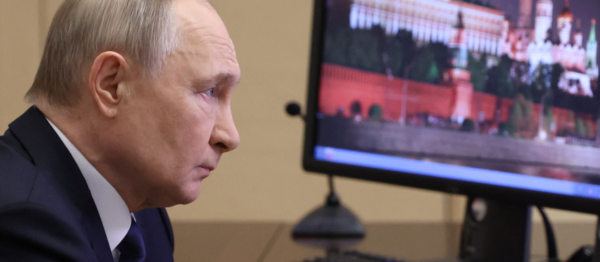 In this pool photograph distributed by Russian state agency Sputnik, Russia's President Vladimir Putin attends a meeting with Chief of the General Staff of the Russian Armed Forces via videoconference at the Novo-Ogaryovo state residence outside Moscow on April 26, 2025. (Photo by Alexander KAZAKOV / POOL / AFP)