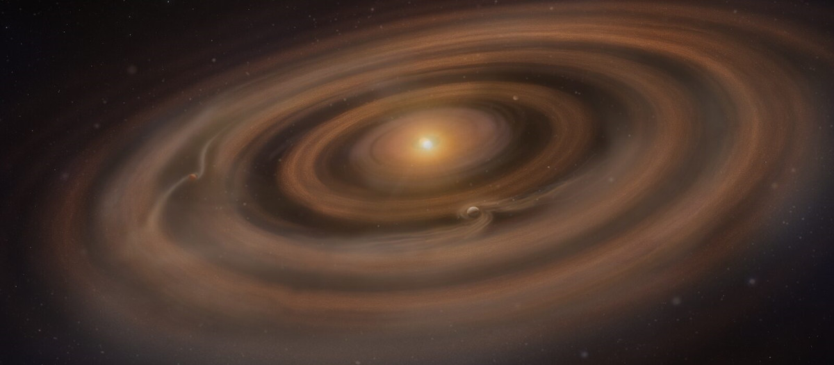 Impresión artística de un disco protoplanetario con planetas en formación que redistribuyen el gas y el polvo a su alrededor