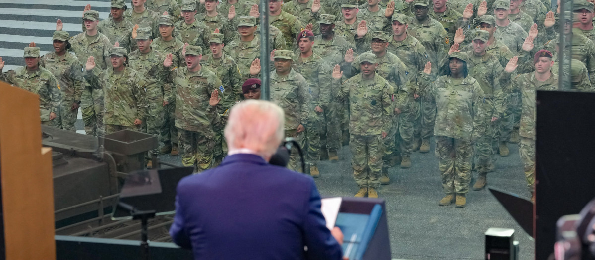 US President Donald Trump speaks during the Army 250th Anniversary Parade in Washington, DC on June 14, 2025. Trump's long-held dream of a parade will come true as nearly 7,000 troops plus dozens of tanks and helicopters rumble through the capital in an event officially marking the 250th anniversary of the US army. (Photo by Doug MILLS / POOL / AFP)