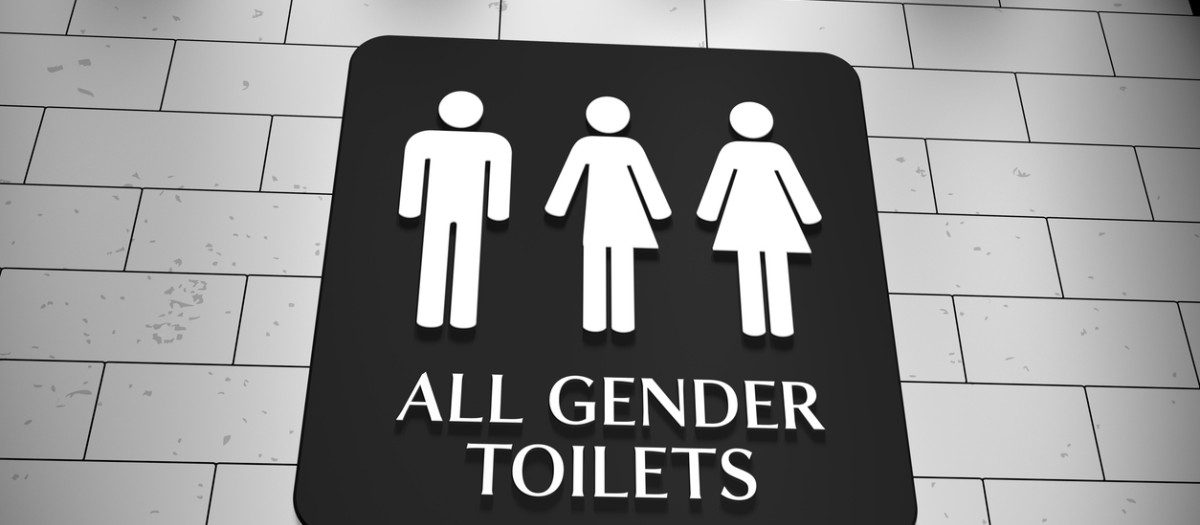 Señal que indica que los baños son "para todos los géneros"