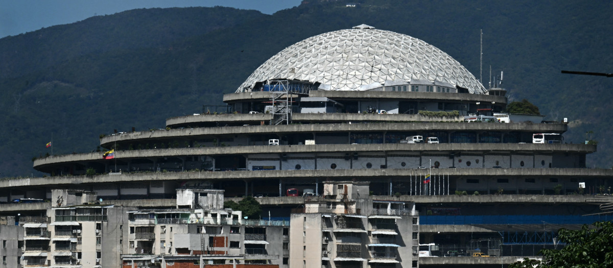 (FILES) This image shows El Helicoide -a facility and prison owned by the Venezuelan government and used for both regular and political prisoners of the Bolivarian National Intelligence Service (SEBIN)- in Caracas on January 8, 2026. Venezuela's interim President Delcy Rodriguez announced the closure of the notorious Helicoide prison in Caracas on January 30, 2026, which has been denounced as a torture centre by the opposition and human rights activists. (Photo by RONALDO SCHEMIDT / AFP)