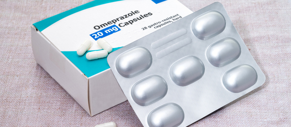 A box and blister pack of generic  Omeprazole pills