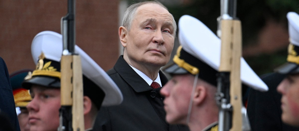Russian President Vladimir Putin attends a ceremony to lay flowers at the Tomb of the Unknown Soldier by the Kremlin wall in central Moscow on May 9, 2026. Russia celebrates the 81st anniversary of the Soviet Union's victory over Nazi Germany in World War Two (WWII). (Photo by Alexander NEMENOV / POOL / AFP)