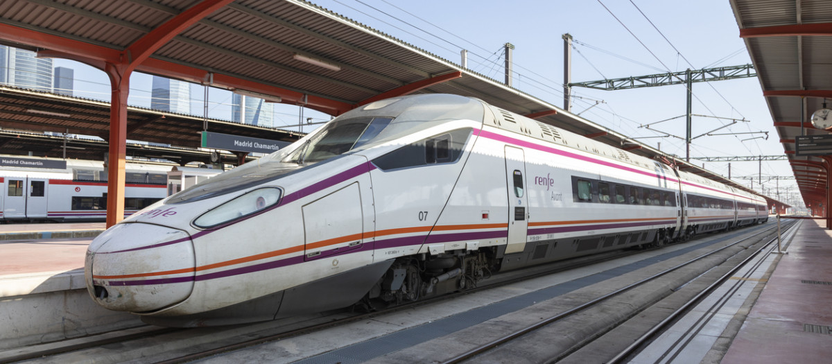 Madrid, Spain - June 2, 2021: Renfe Avant medium distance train and its wagons, parked on one of the platforms of the Chamartin train station