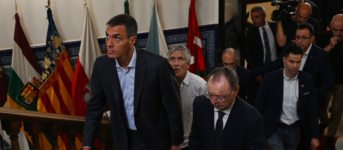 Pedro Sánchez, Fernando Grande-Marlaska y el presidente de Ceuta, Juan José Vivas