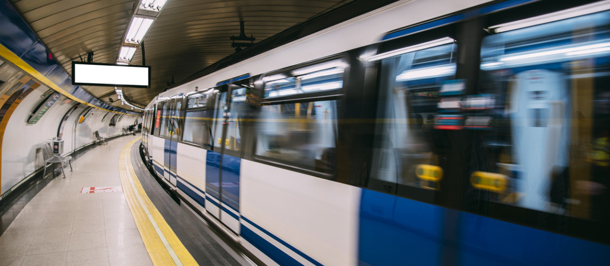 An underground train in motion in Madrid, Spain.