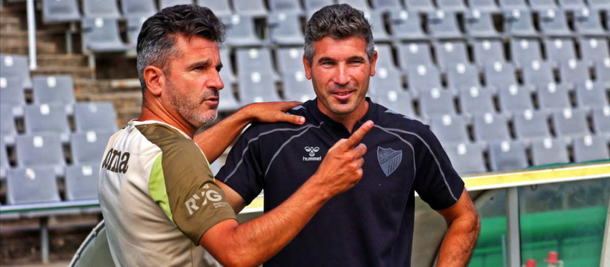 Iván Ania junto al entrenador del Málaga, Juan Francisco Funes