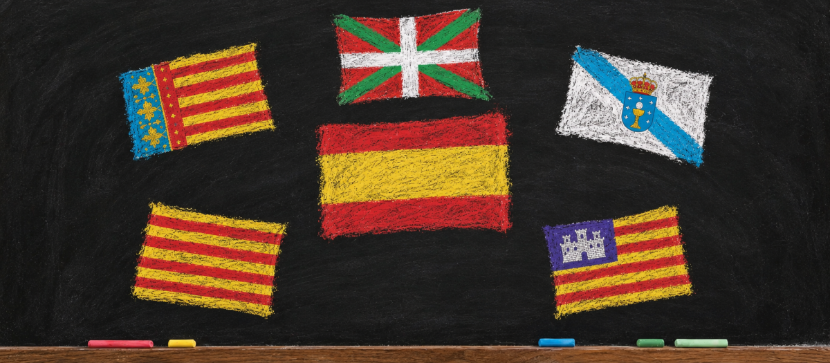 Banderas de la Comunidad Valenciana, Galicia, País Vasco, Cataluña y Baleares en torno a la bandera de España