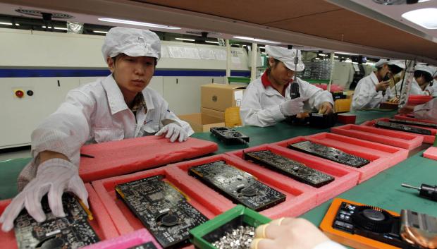 Operarios de la fábrica de Foxconn, la ciudad del Iphone en China