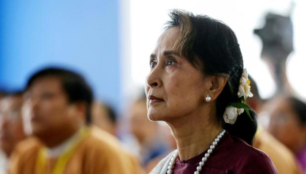 (FILES) In this file photo taken on July 17, 2019, Myanmar's State Counsellor Aung San Suu Kyi attends the opening ceremony of the Yangon Innovation Centre in Yangon. - Myanmar's junta has charged Aung San Suu Kyi with influencing election officials during 2020 polls, a source said on January 31, 2022, a year after it staged a coup alleging massive voter fraud. (Photo by AFP)