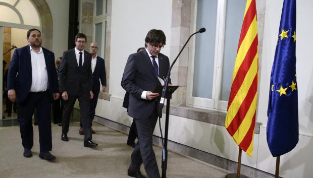 Puigdemont, el 6 de septiembre de 2017, anunciando la firma del decreto que convocaba la votación del referéndum del 1-O