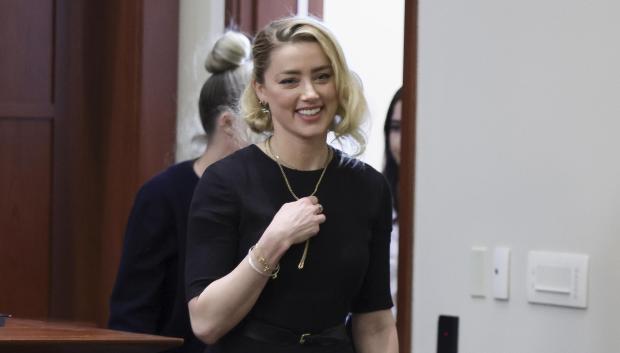 Actress Amber Heard  arrives before the verdict was read at the Fairfax County Circuit Courthouse in Fairfax, Va, Wednesday, June 1, 2022.