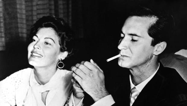 Ava Gardner dines with Spanish bullfighter Miguel Luis Dominguin at a hotel in Reno, Nevada while she sits out the required six-weeks residence for a divorce from singer Frank Sinatra, 1954 
1950s Candids Candid Dominguin,luis Miguel EV-IN Gardner,ava Jsx-24