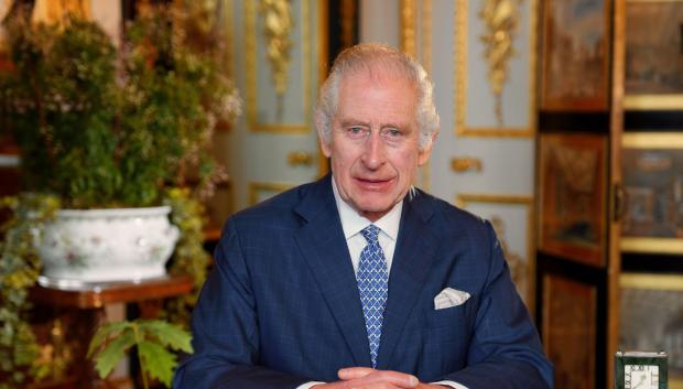 Handout photo issued by the Royal Household of King Charles III during the recording of the The King's Commonwealth message which was filmed in the White Drawing Room at WindsorCastle in February.