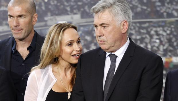 Real Madrid's coach Carlo Ancelotti with Mariann Barrena during his presentation at the Bernabeu Stadium, in Madrid on Wednesday, June 26, 2013.