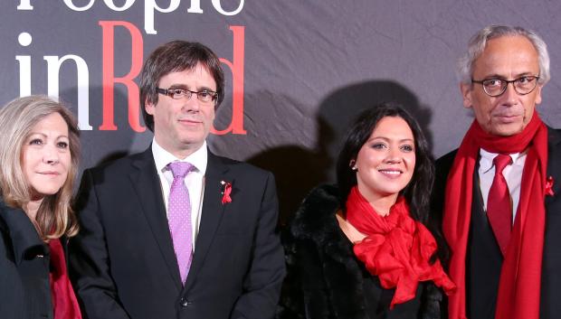 Carles Puigdemont with wife Marcela Topor and Bonaventura Clotet durante la Gala " Fundación Lluita contra el Sida : People in Red " 2016