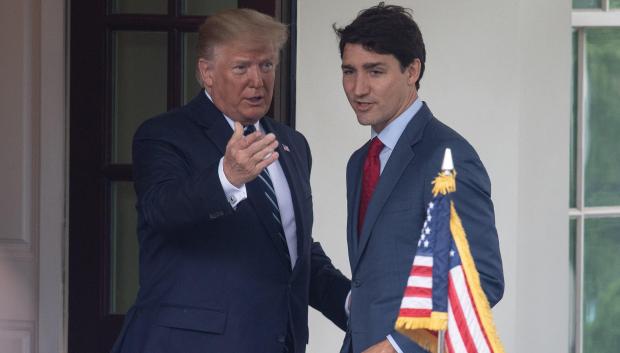 (FILES) US Presidnt Donald Trump greets Canadian Prime Minister Justin Trudeau at the White House in Washington, DC, on June 20, 2019. Canadian Prime Minister Justin Trudeau arrived in Palm Beach, Florida, on November 30, 2024 for what Canadian and American media said was a meeting with US President-elect Donald Trump at his Mar-a-Lago luxury estate. (Photo by NICHOLAS KAMM / AFP)