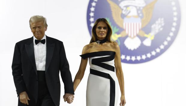 WASHINGTON, DC - JANUARY 20: President Donald Trump walks onstage with wife Melania at the Commander-in-Chief Ball on January 20, 2025 in Washington, DC. President Trump attends some of the inaugural balls after taking the oath as the 47th president. Credit: Anna Moneymaker / Pool via CNP