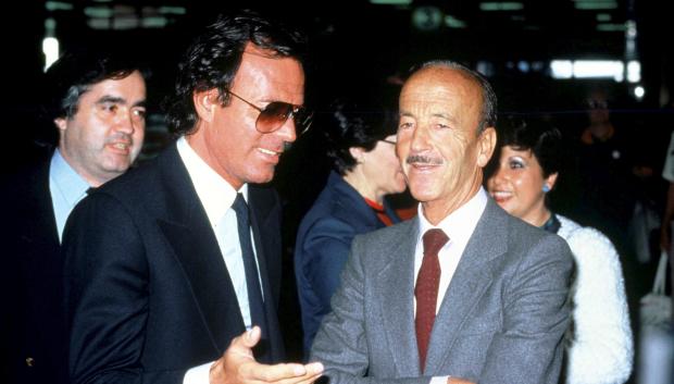 Spain Singer Julio Iglesias and Dr. Puga Iglesias (father of Julio Iglesias)     attend the communion of the former's youngest son and receive a prize from     the "El Tiempo" newspaper. Madrid, SPAIN - 05/1984.