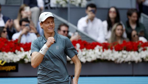 Italy's Jannik Sinner celebrates winning the 2026 ATP Tour Madrid Open tennis tournament final singles match against Germany's Alexander Zverev at the Caja Magica in Madrid, on May 3, 2026. (Photo by Oscar DEL POZO / AFP)